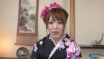 An asian girl feigns disinterest until an erect penis is directed towards her face