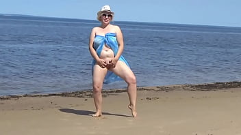 Hot milf in a white bikini seduces with naked ass Hot milf in a white bikini seduces with naked ass