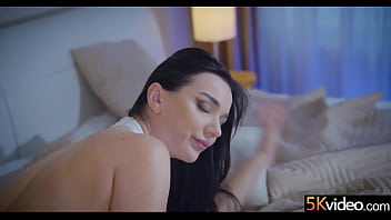 With her tits busting out of her dress and the tops of her lacy thigh highs visible just beneath her dress With her tits busting out of her dress and the tops of her lacy thigh highs visible just beneath her dress