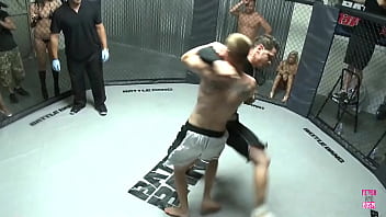 Ally kay a versatile blonde maintains a wide stance as the victor of the fight thrusts