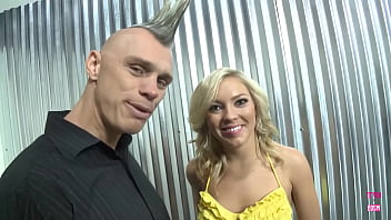 Ally kay a versatile blonde maintains a wide stance as the victor of the fight thrusts