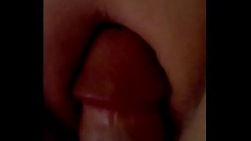 Rubbing her pussy with his shaft