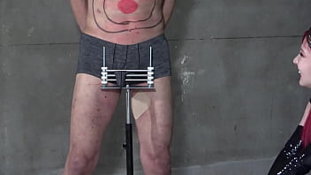 Domina chisei pounds the slave's cock with a riding whip but he can't escape because the slave's cock is trapped