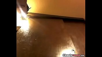 Curly brunette masturbation from the floor