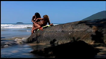 Young lesbians have sensual intercourse licking and toying their tight holes on the seaside