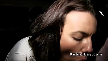 Busty fired beauty sucks cock in public