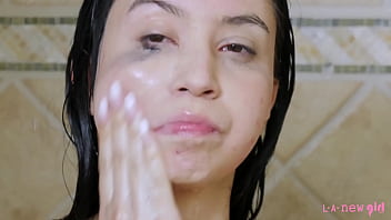 Beautiful teen brunette washes her body & shows teen body