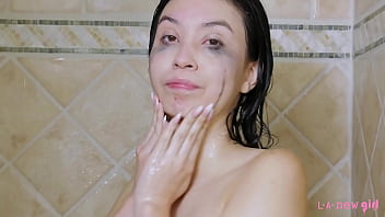 Beautiful teen brunette washes her body & shows teen body