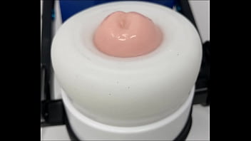 Sex robot doing a demo of some sex toys Sex robot doing a demo of some sex toys