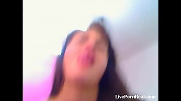 Brunette having fun with her purple dildo 2