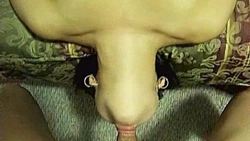 Small tit brunette gives blowjob to a big cock
