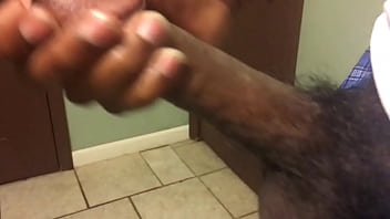 Young black guy jerks cock