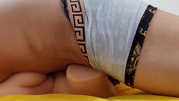 Young man with a big carrot fucking his sex doll my big cock