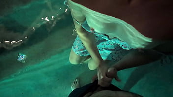Babe in dress gets in the water to fuck