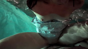 Babe in dress gets in the water to fuck