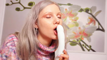 A nymph in a sweater expands her holes by inserting a vibrator blowjob and female orgasm