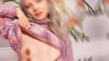 A nymph in a sweater expands her holes by inserting a vibrator blowjob and female orgasm