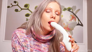 A nymph in a sweater expands her holes by inserting a vibrator blowjob and female orgasm