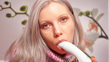 A nymph in a sweater expands her holes by inserting a vibrator blowjob and female orgasm