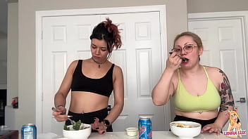 Two friends eat and belch