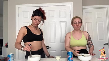 Two friends eat and belch