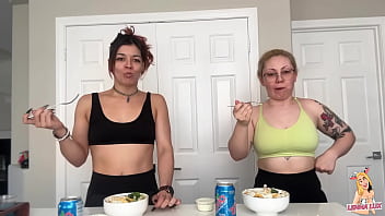 Two friends eat and belch