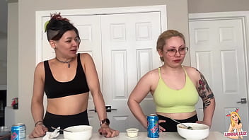 Two friends eat and belch