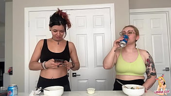 Two friends eat and belch