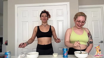 Two friends eat and belch