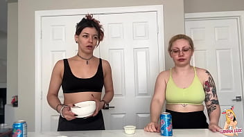 Two friends eat and belch