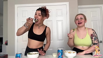 Two friends eat and belch