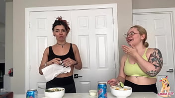 Two friends eat and belch