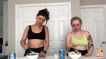 Two friends eat and belch