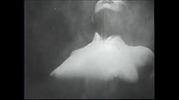 Long Haired Brunette Posing For An Erotic Shoot thumbnail