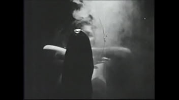 Long haired brunette posing for an erotic shoot