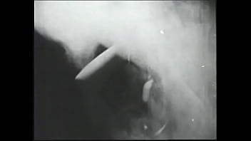 Long haired brunette posing for an erotic shoot