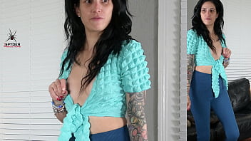 Jazmin tries on leggings and wrap shirt for photoshoot