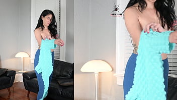 Jazmin tries on leggings and wrap shirt for photoshoot