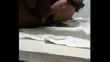 Guy fingers himself in restroom