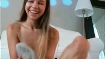 Cute young blonde in front of cam