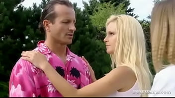 Nikki sun gingerly licks a cock while lounging outside