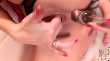 Pumping her tight ass with a dildo