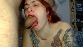 Redhead of tattoed body in sloppy facefuck with rough gagging