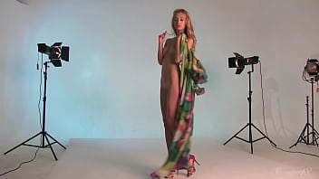 Blonde teen with bright hazel eyes in the nude