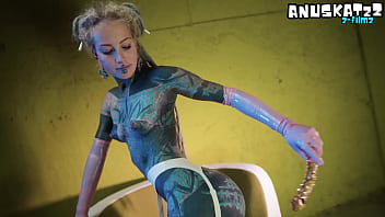 Sexy tattooed babe in latex stretching herself wide with her toys