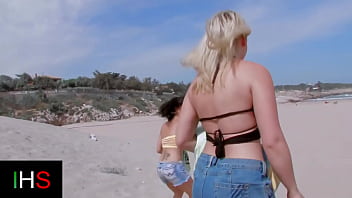 Brunette girl and blonde girl fucked at the seaside by a hot male