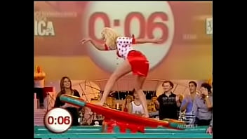A blonde italian celeb is doing some indoor surfing for a tv show in a miniskirt it was always clear there was be the inevitable upskirt oops fun