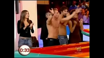 A blonde italian celeb is doing some indoor surfing for a tv show in a miniskirt it was always clear there was be the inevitable upskirt oops fun