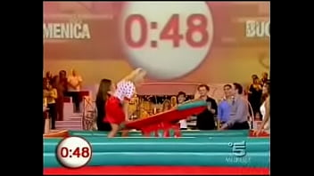 A blonde italian celeb is doing some indoor surfing for a tv show in a miniskirt it was always clear there was be the inevitable upskirt oops fun
