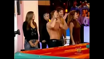 A blonde italian celeb is doing some indoor surfing for a tv show in a miniskirt it was always clear there was be the inevitable upskirt oops fun